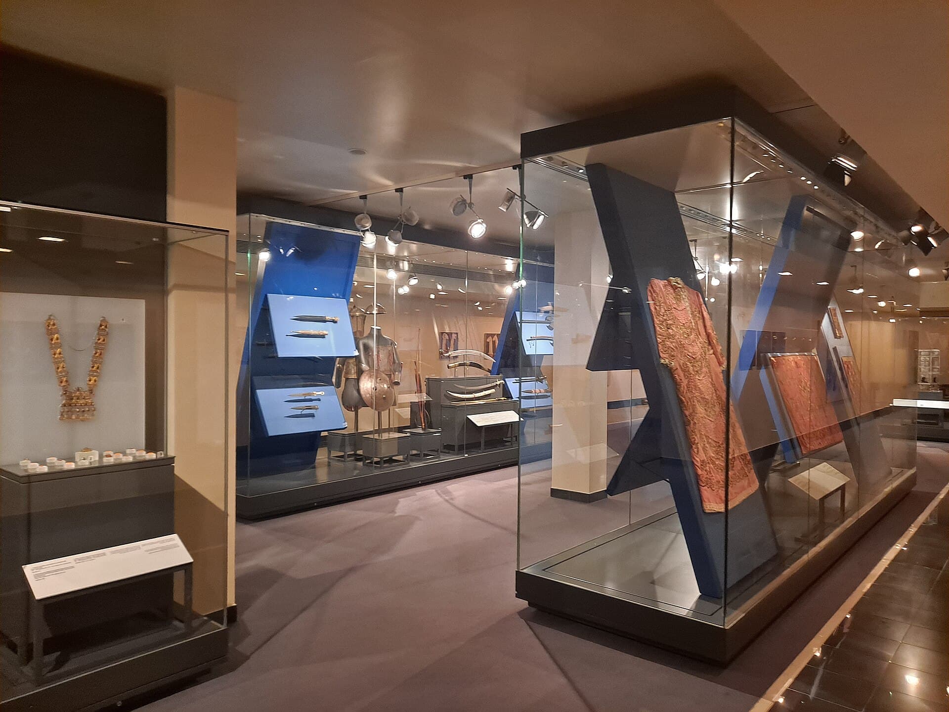 A gallery in the Sharjah Museum of Islamic Civilization, with jewellery, weapons and textiles.